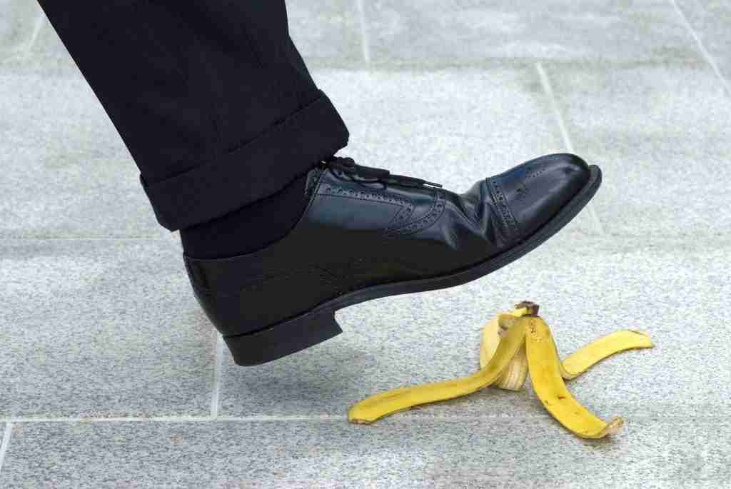 person is going step banana peel