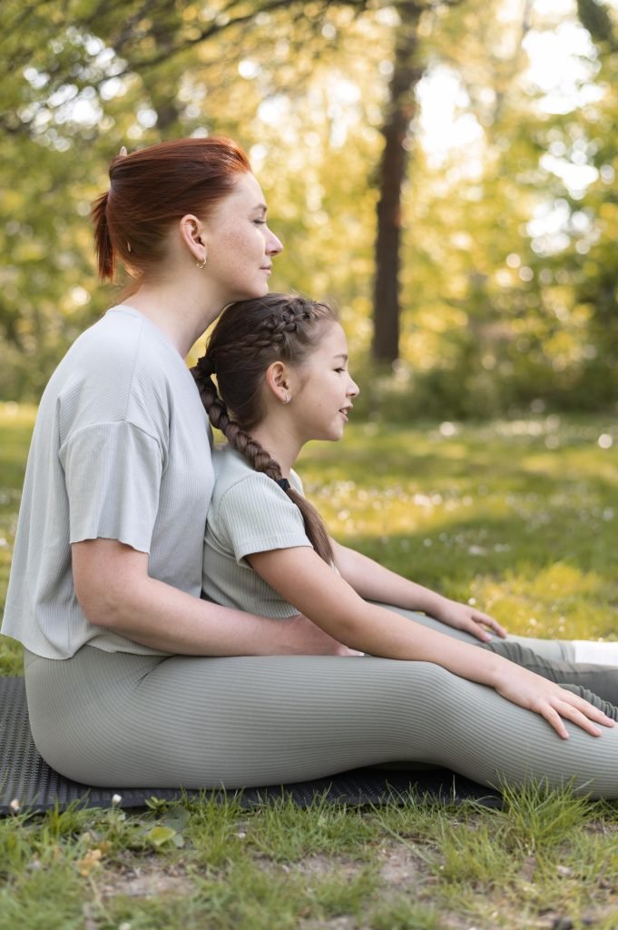 Cultivating Connection - Mindful Parenting Tips 1 woman kid sitting together