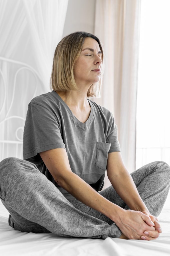 Mindfulness Techniques to Boost Focus and Concentration 2 A woman practising mindfulness