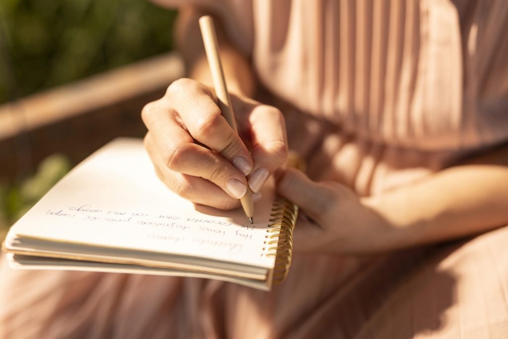 How to Use Journaling for Spiritual Awakening 2 A woman using journaling for self-exploration