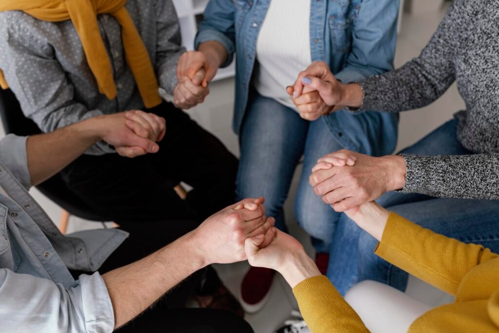 The Importance of Community in Spiritual Awakening 2 People supporting each other in a community