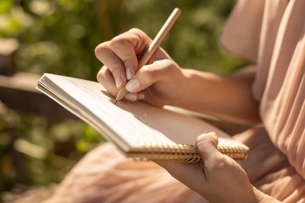 How to Use Journaling for Spiritual Awakening 1 A woman journaling her thoughts