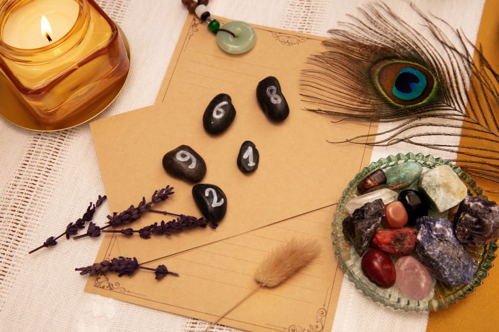 Creating Sacred Spaces to Support Your Spiritual Awakening 2 Sacred space with crystals, candle and a feather