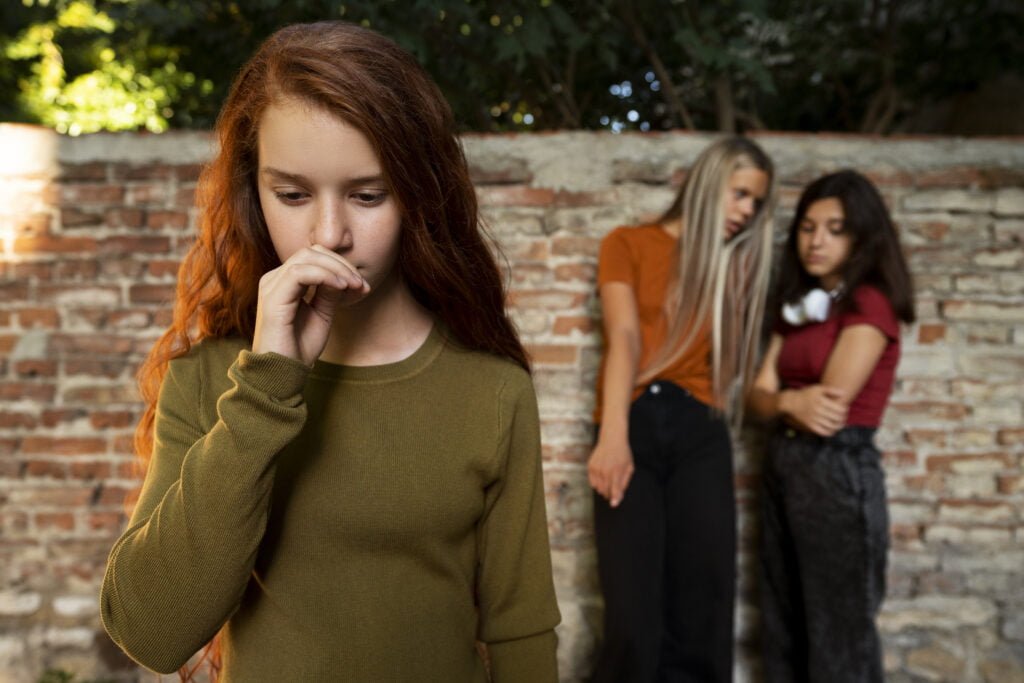 How to Practice Self-Love in the Face of Societal Pressure 2 A young girl under societal pressure