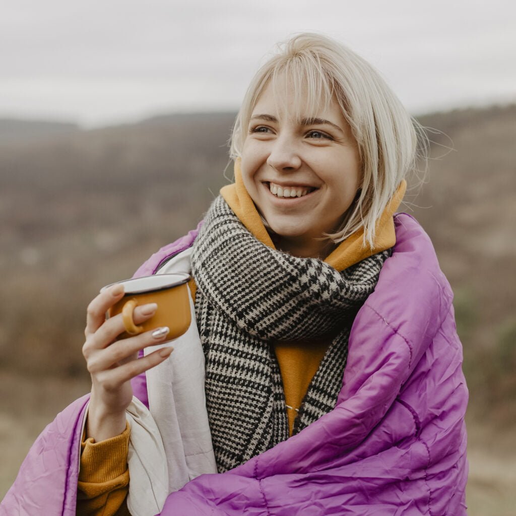 Navigating Midlife with Self-Love - Tips for Women Over 40 3 A woman happy with her newfound authenticity in midlife