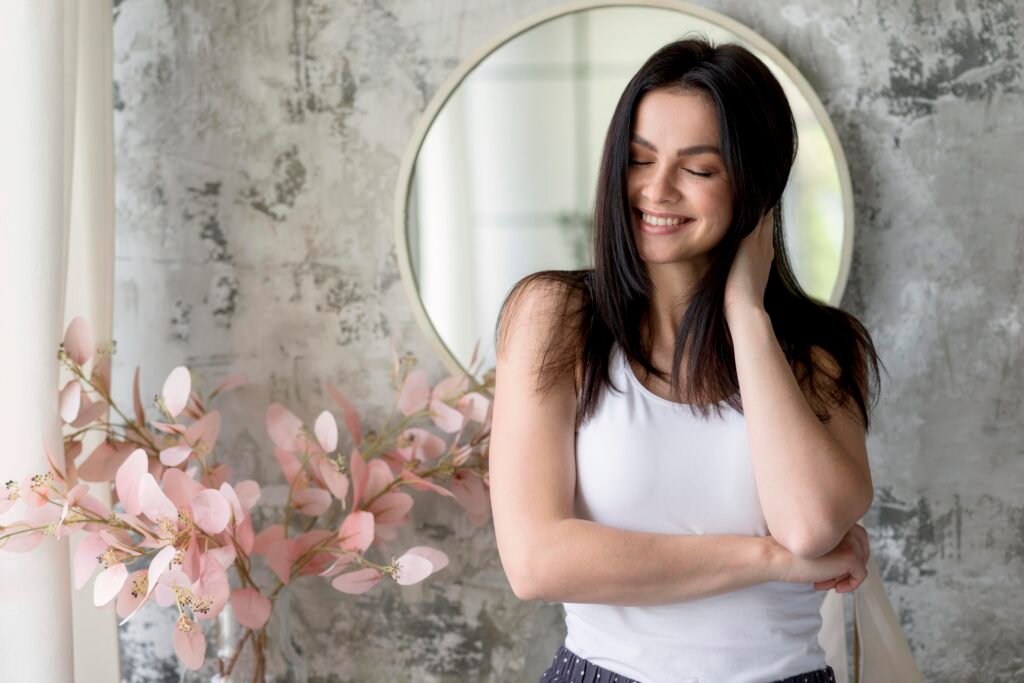 Self-Love vs. Self-Care - What's the Difference and Why Both Matter? 1 A woman happy after self-care