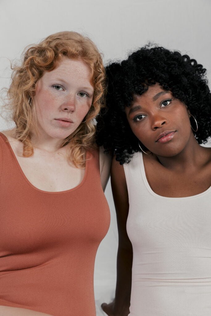 How to Stop Comparing Yourself to Others and Start Loving Yourself 3 Two women embracing themselves and each other without comparison