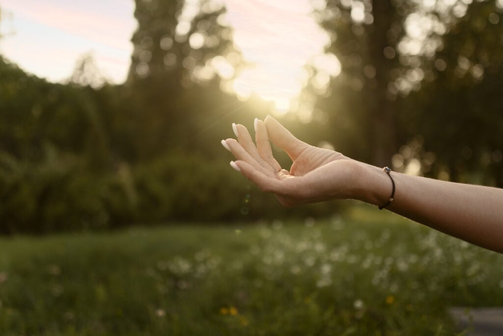 Self-Love and Spiritual Growth - Connecting with Your Higher Self 2 A woman's hand in mudra