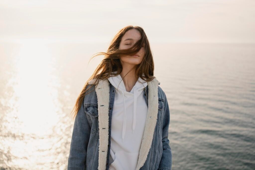 10 Daily Practices to Boost Your Self-Love and Confidence 4 A woman enjoying mindfully the body sensations