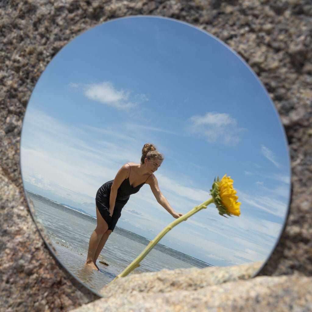 Why Self-Love is Crucial for Personal Transformation and Growth 3 A woman nurturing growth and transformation with self-love