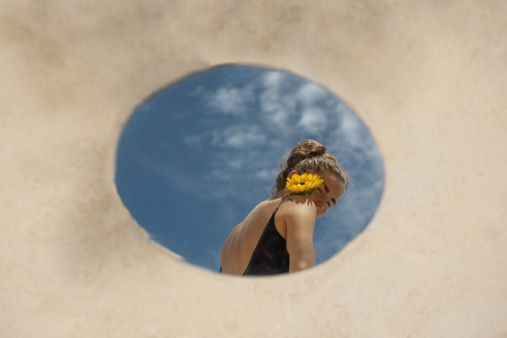 Why Self-Love is Crucial for Personal Transformation and Growth 1 A woman glowing with self-love