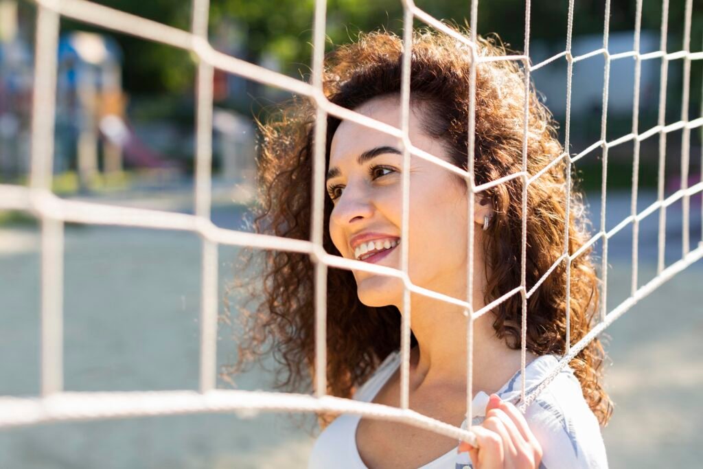 How to Set Boundaries with Love and Respect for Yourself 2 A woman happy about how her boundaries are protecting her