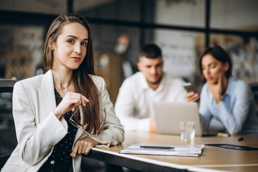 Why Self-Love is Essential for Effective Leadership 2 A young woman being mindful in an office