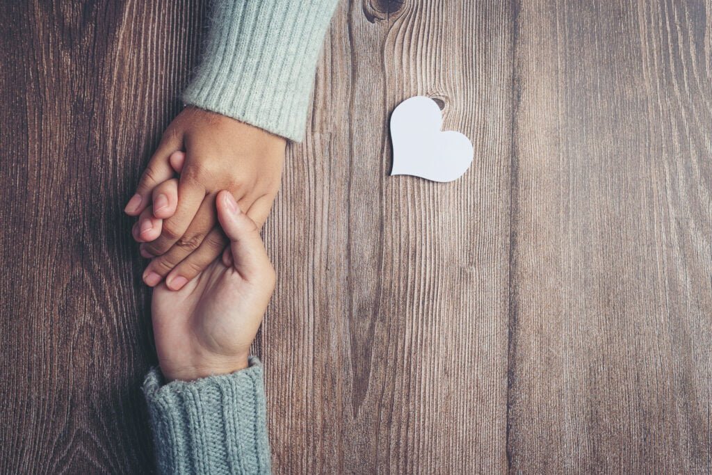 Understanding the Role of Gratitude in the Law of Attraction 1 Two people expressing gratitude