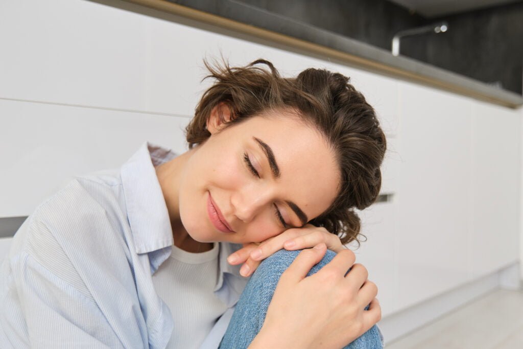 The Role of Forgiveness in Clearing Blockages to Manifestation 5 A woman feeling the relief of self-forgiveness
