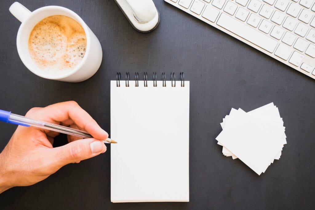 Using the 5x55 Method for Rapid Manifestation 2 A person ready to write with the non-dominant hand 5x55