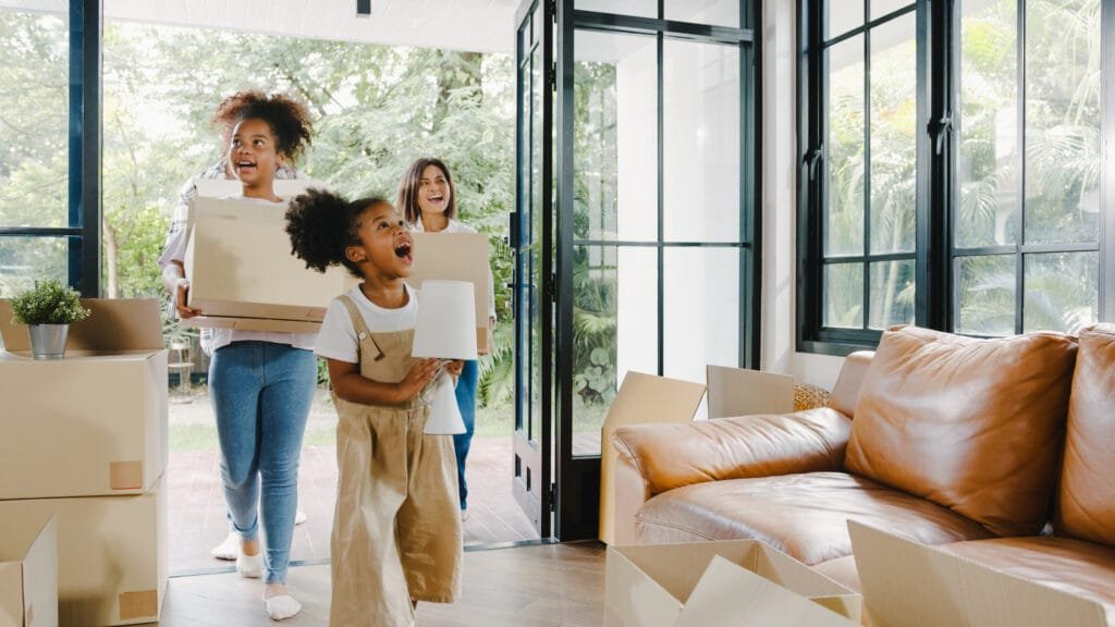 How to Use the Law of Attraction to Manifest Your Dream Home 5 A family moving into their dream home