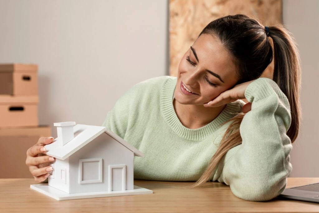 How to Use the Law of Attraction to Manifest Your Dream Home 1 A woman manifesting her dream home