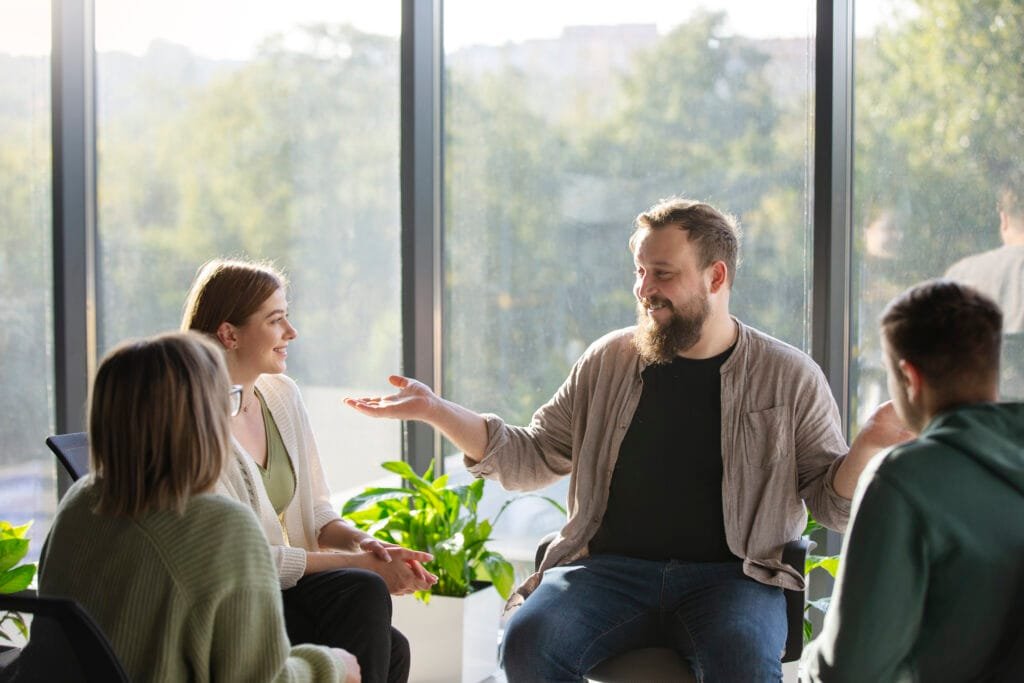 How to Use the Law of Attraction to Improve Your Communication Skills 5 A group of friends in an engaging conversation