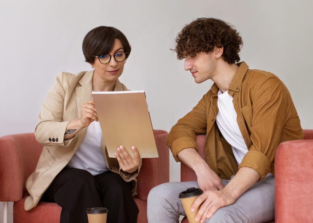 How to Use the Law of Attraction to Improve Your Communication Skills 3 Two colleagues in an engaging communication