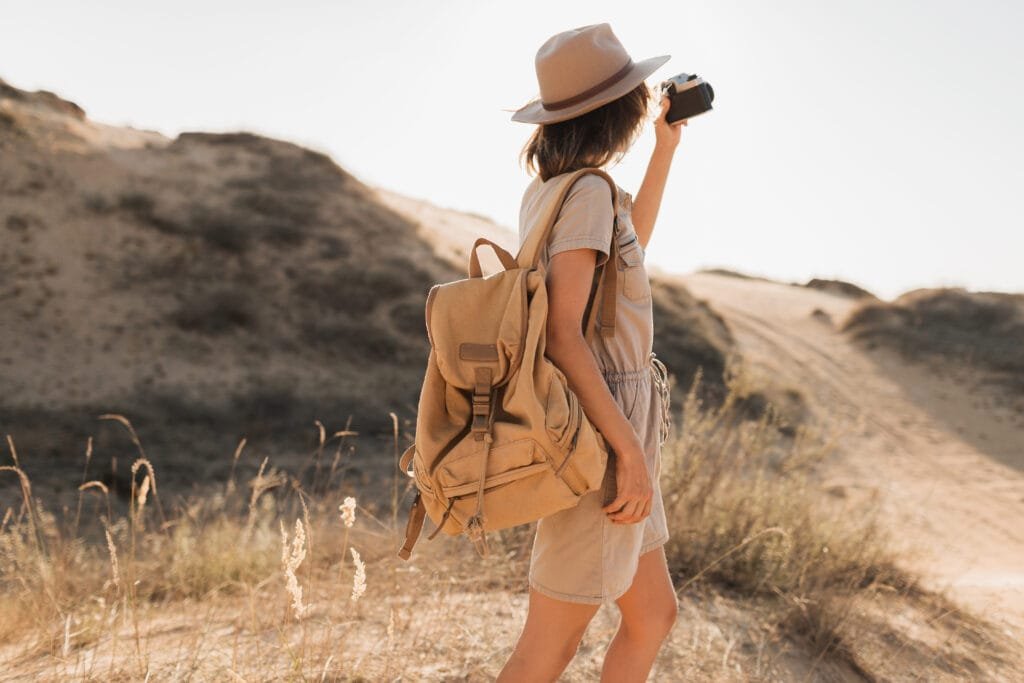 Manifesting Travel and Adventure - Using the Law of Attraction for Experiences 1 A stylish woman on her travel and adventure