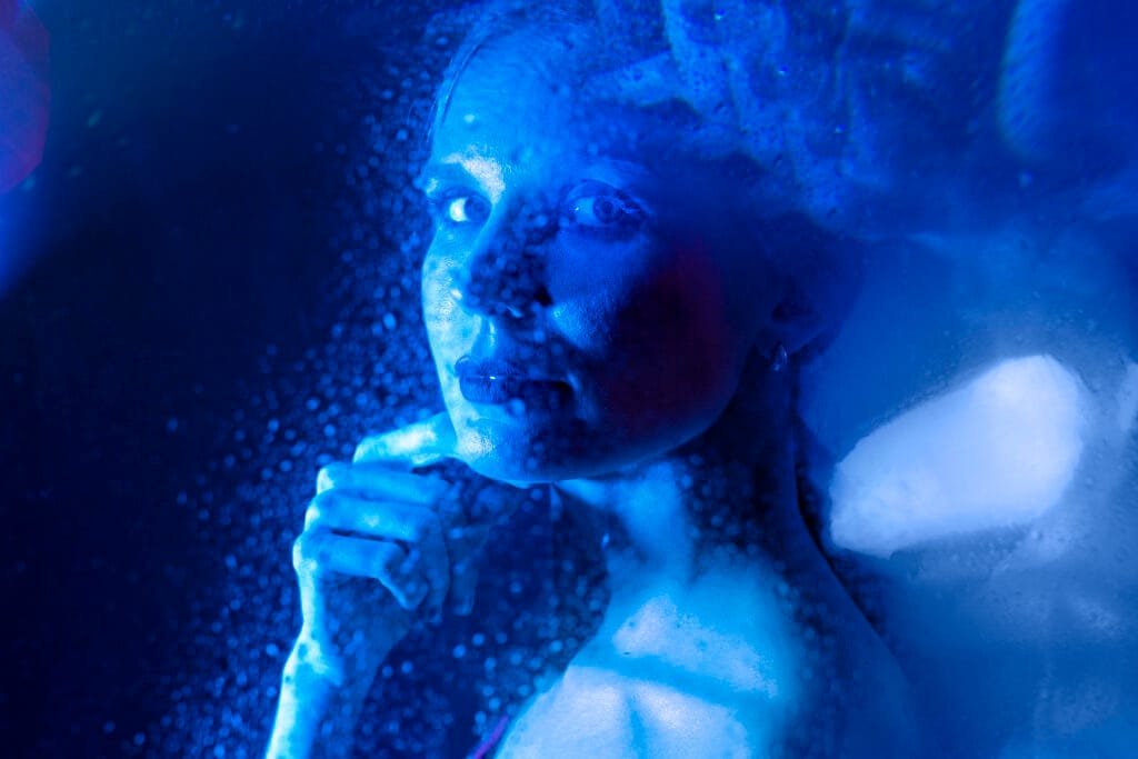 The Future of Manifestation - Emerging Trends and Technologies in the Law of Attraction 2 A woman feeling the energy of her manifestation