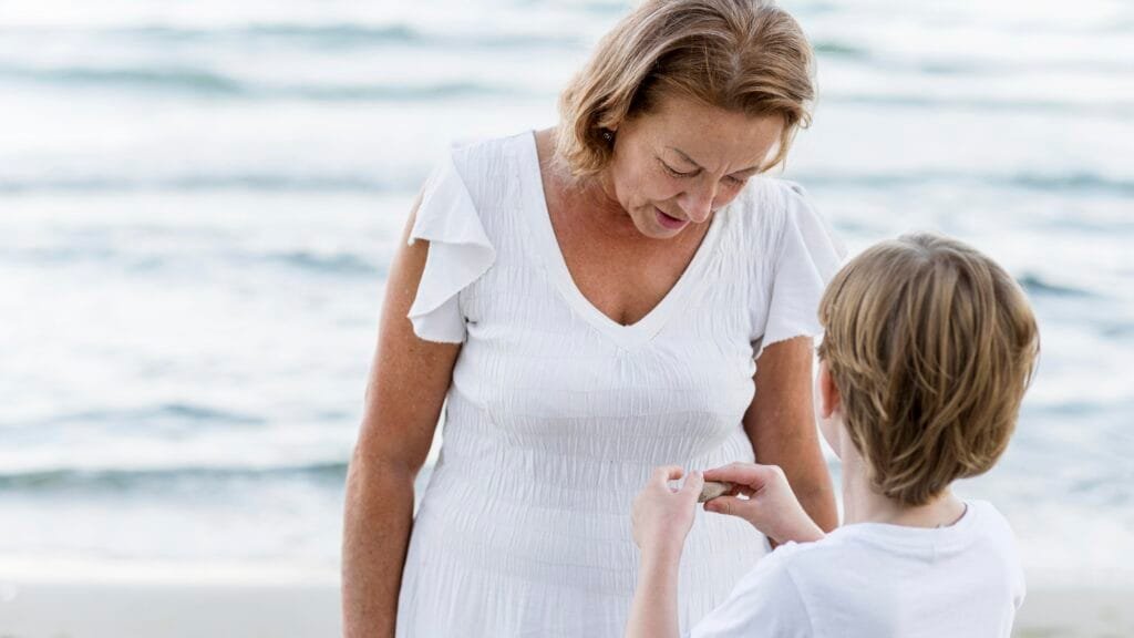 Teaching Children Emotional Awareness Through Mindfulness - A Parent's Guide 1 A grandparent teaching a grandchild mindfulness