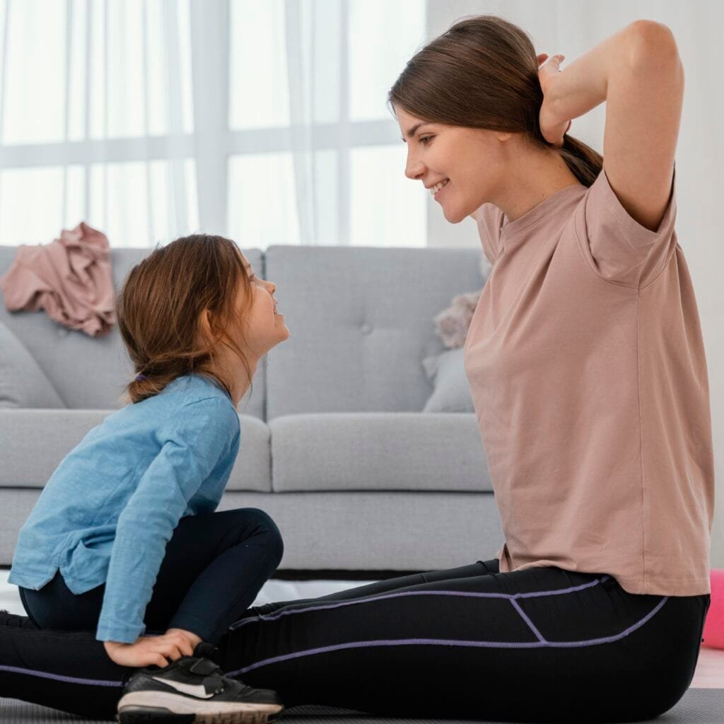 5 Mindful Breathing Techniques to Stay Calm as a Parent 3 A mother teaching her daughter mindful breathing