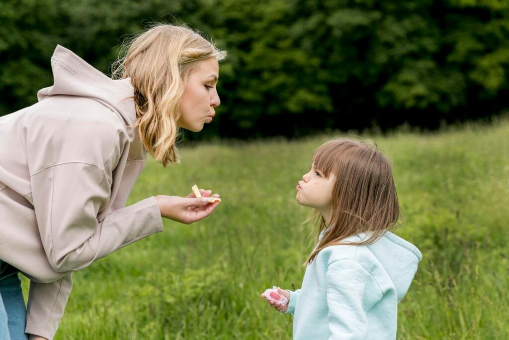 Teaching Children Emotional Awareness Through Mindfulness - A Parent's Guide 3 A parent and a child practicing mindfulness