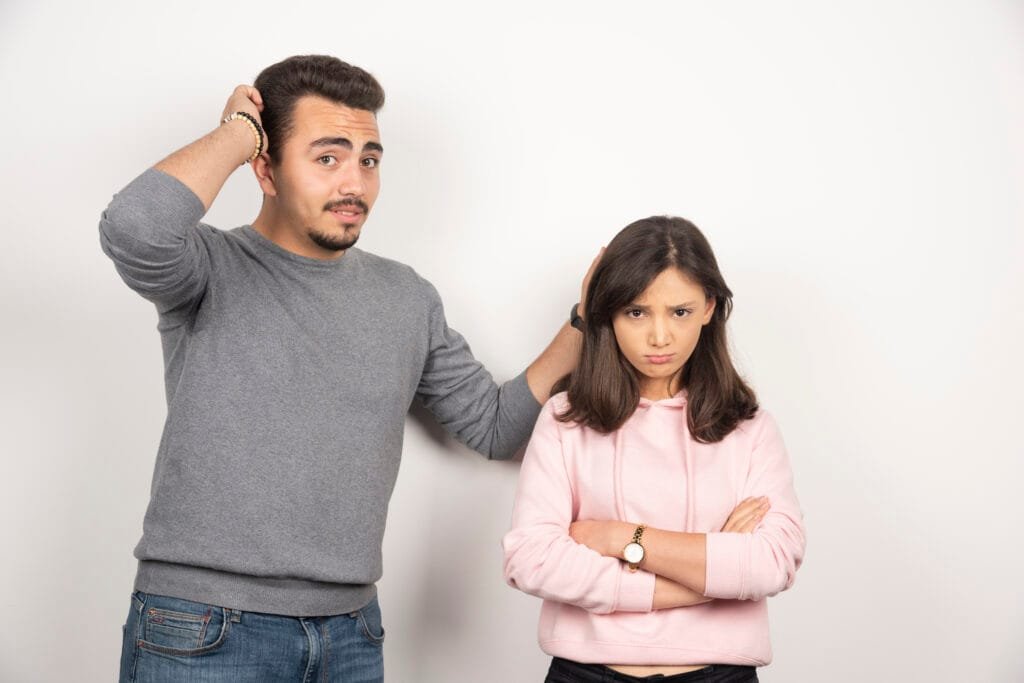 How to Stay Present During Parent Stress - Essential Mindfulness Tips 2 A man not knowing how to calm down a teenager