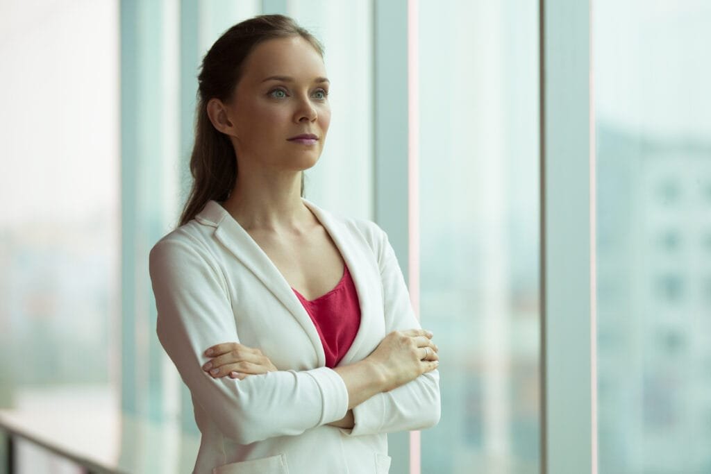 A woman feeling empowered after a coaching session