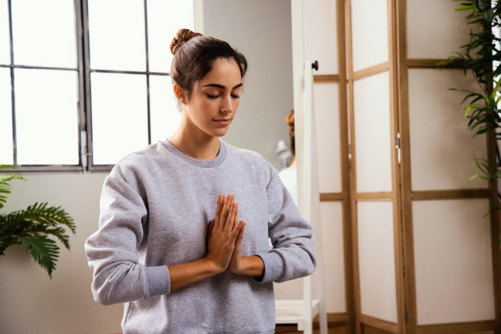 Mindful Self-Compassion for Imperfect Parents 1 A woman practising self-compassion while meditating
